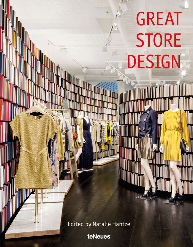 Women's fashion store interior, clothed mannequins, floor to ceiling shelves full of books, 'GREAT STORE DESIGN', in red font to top right corner.