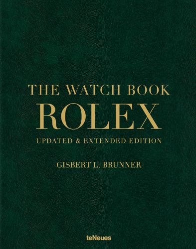 Dark green leather bound cover with The Watch Book Rolex in gold font