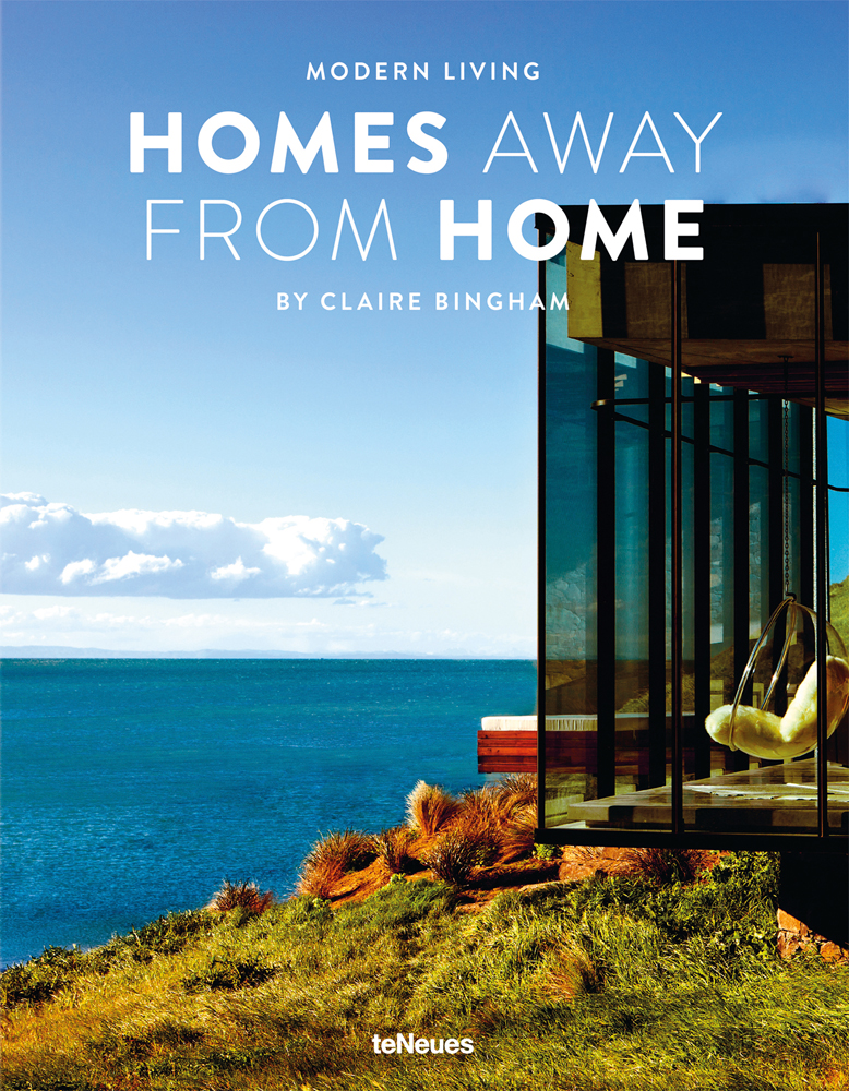 Glass holiday home by the sea, HOMES AWAY FROM HOME, in white font above.