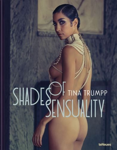 Nude female with high neck jewellery piece made of pearls looking seductively at camera with Shades of Sensuality Tina Trumpp in pale grey and white font