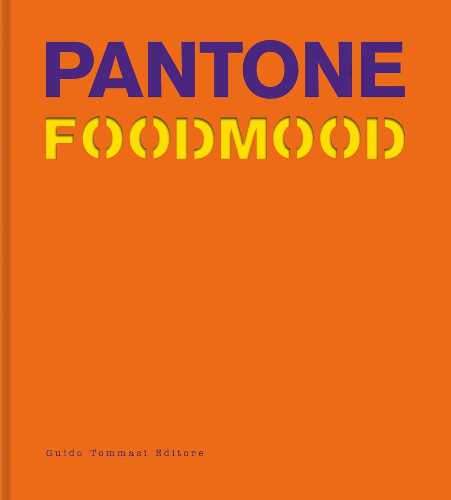 Bright orange cover with Pantone in purple font and Foodmood in yellow stencilled font