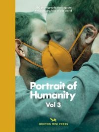 Two white males wearing yellow face masks, faces pressed to each others, on cover of 'Portrait of Humanity 3', by Hoxton Mini Press.