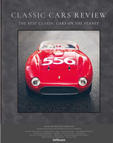 1953 Red Ferrari 166 MM Spider, '556' in white on bonnet, grey cover, CLASSIC CARS REVIEW, in silver font above.