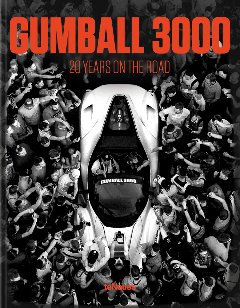 Aerial shot of supercar surrounded by crowds of people taking photographs, 'GUMBALL 3000', in red font above, by teNeues Books.