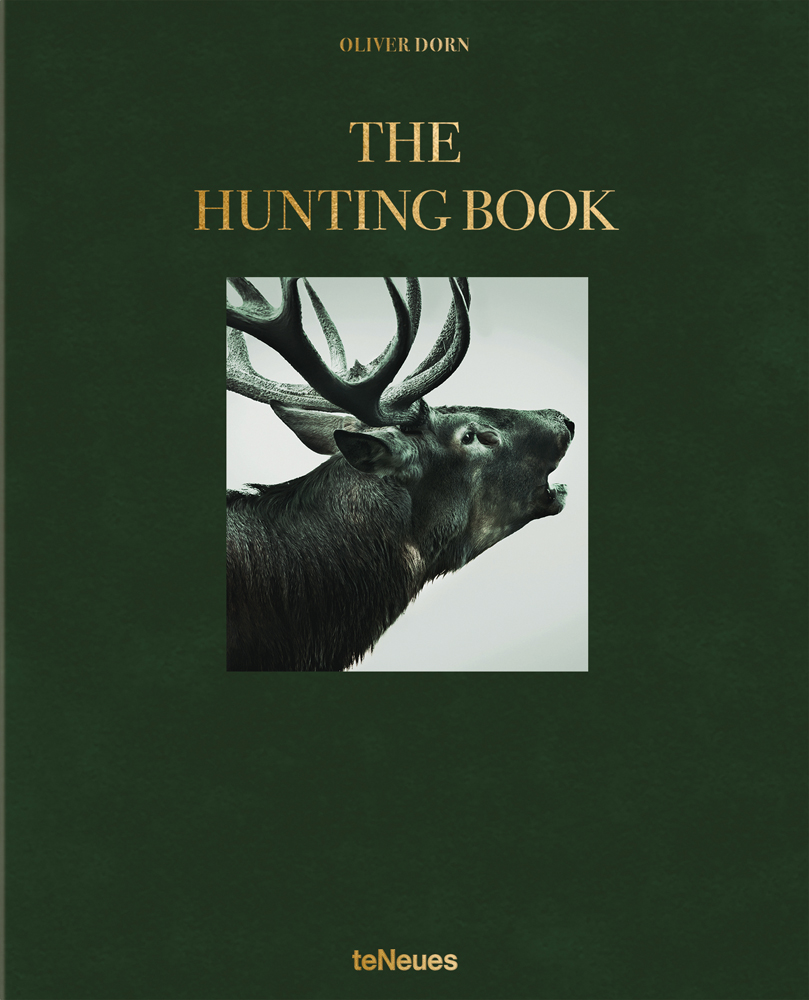 Head and should profile shot of a stag rearing its head mouth open on a dark green cover with Oliver Dorn The Hunting Book in gold capital letters above