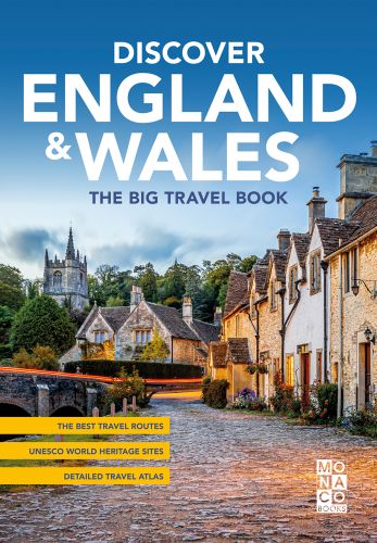 Inviting cobbled street with houses, a stone bridge and steeple with Discover England & Wales in large white font above