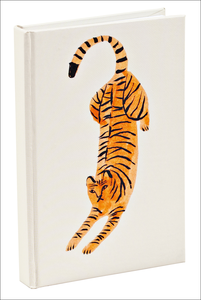 Bear meditating, with bright orange sun above, FOCUS ON GRATITUDE, in white font to centre of teNeues stationery journal.