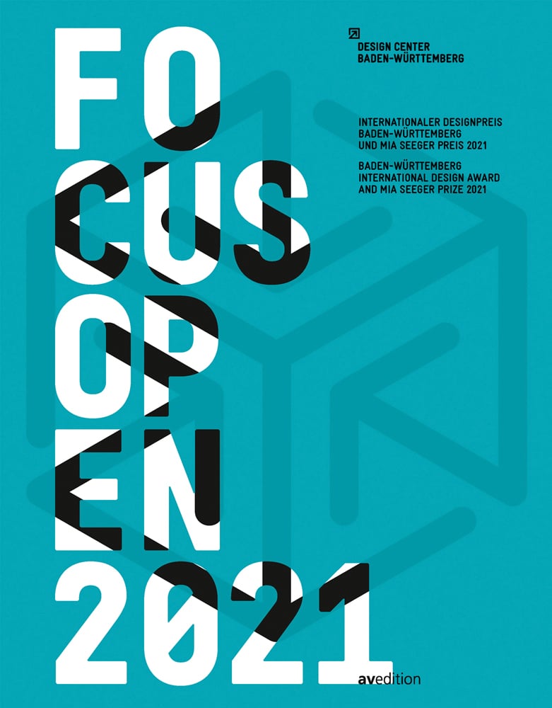 Turquoise cover with darker hexagonal shape and Focus Open 2021 in black and white patterned font