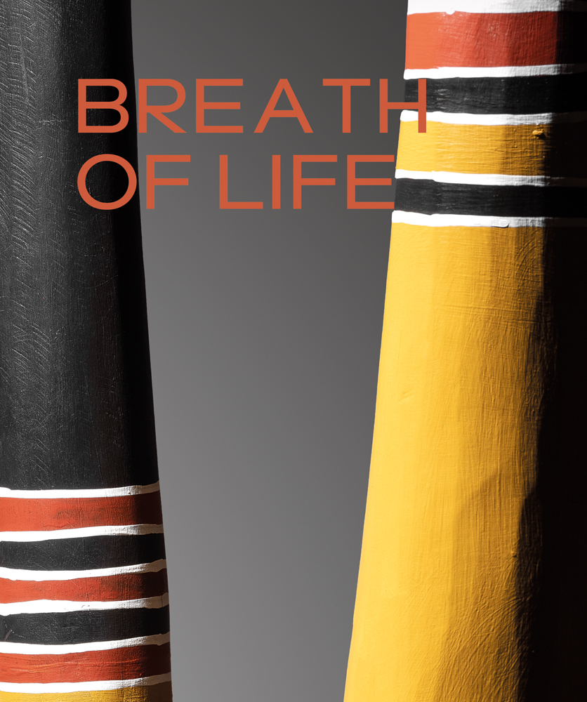 Book cover of Breath of Life, with two Yidaki instruments in black and yellow with white painted rings. Published by 5 Continents Editions.