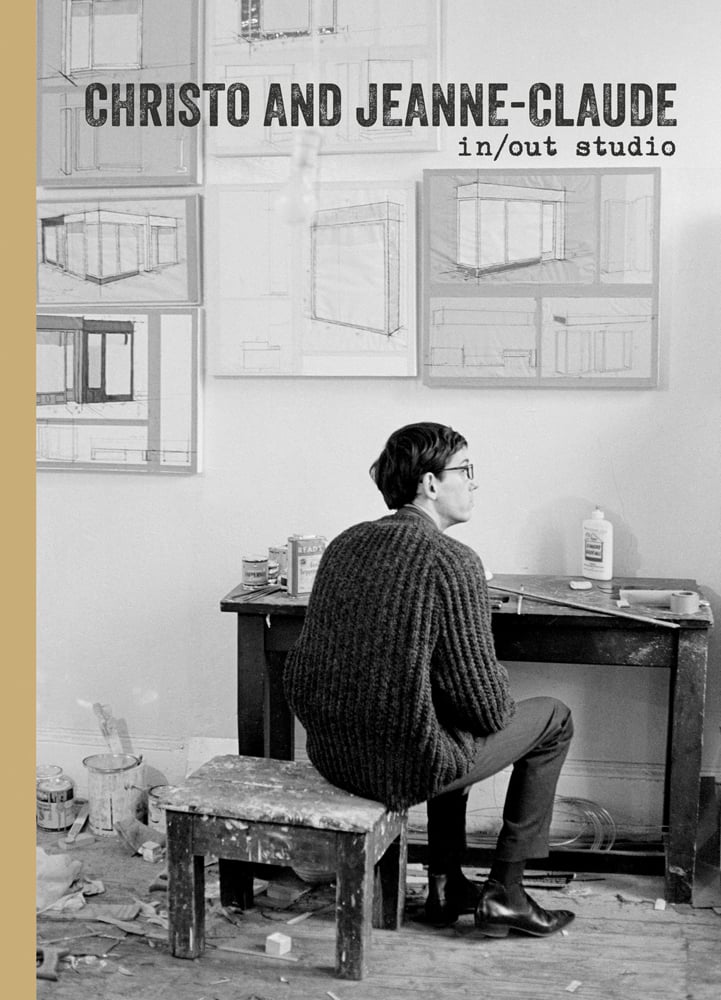 Book cover of Christo and Jeanne-Claude: In/Out Studio, with young man perched on low stool in studio facing away from viewer. Published by Verlag Kettler.