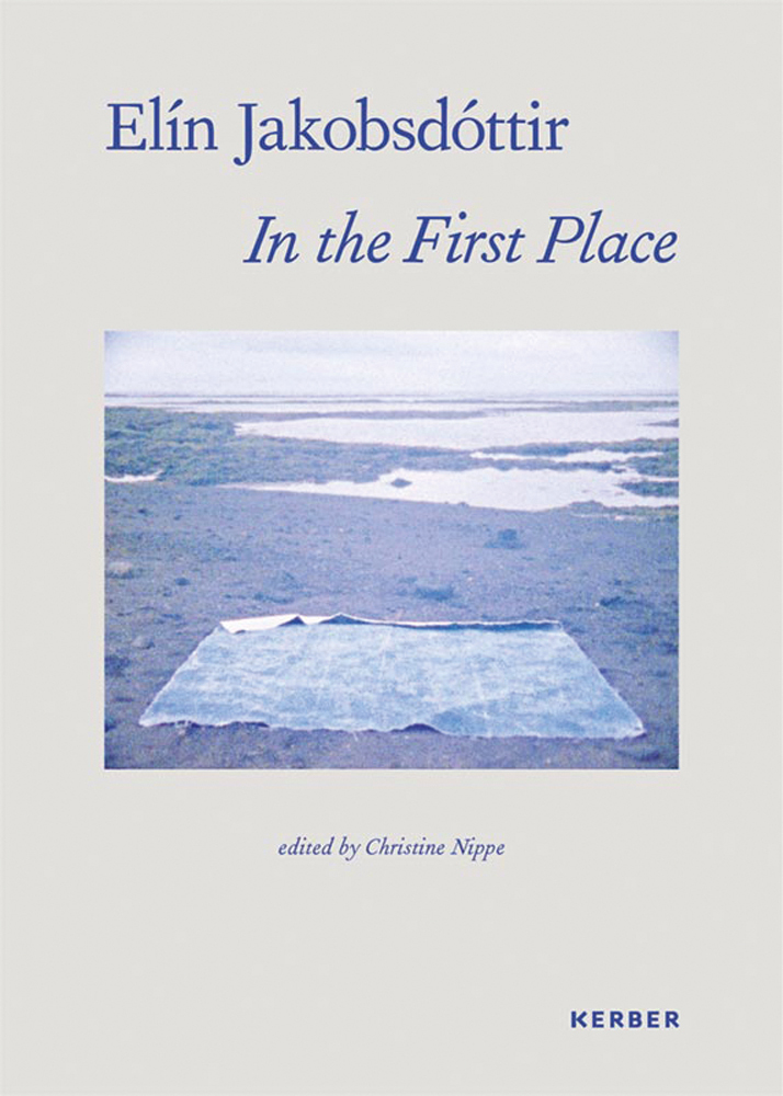 Pale grey cover with blue filter photo of landscape with piece of fabric on ground and Elín Jakobsdóttir in blue font above