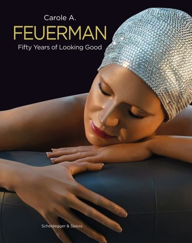 Hyper realistic head and shoulder sculpture of women in silver sequinned hat, Carole A. Feuerman in white and pale yellow font