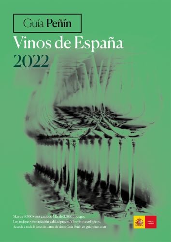 Green cover with blurred image of a line of wine glasses and Guía Peñín Vinos de España 2022 in black and white font above