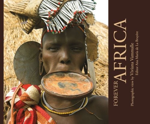 Black tribe member with large lip plate with FOREVER AFRICA in beige font on brown right border
