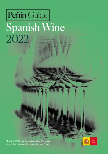 Green cover with blurred image of a line of wine glasses and Peñín Guide Spanish Wine 2022 in black and white font above