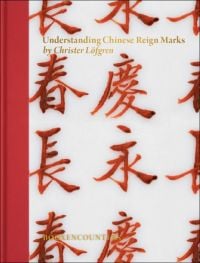 Red Chinese reign marks on white porcelain, on cover of with 'Understanding Chinese Reign Marks, A radical and new interpretation of the term ”Mark and Period.”', by Booxencounters.