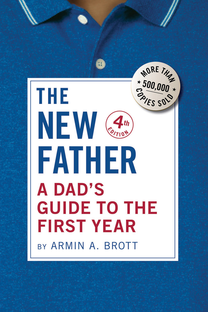 Blue polo shirt close up with a white square text box over the top with The New Father A Dad’s Guide to the First Year in blue and red font