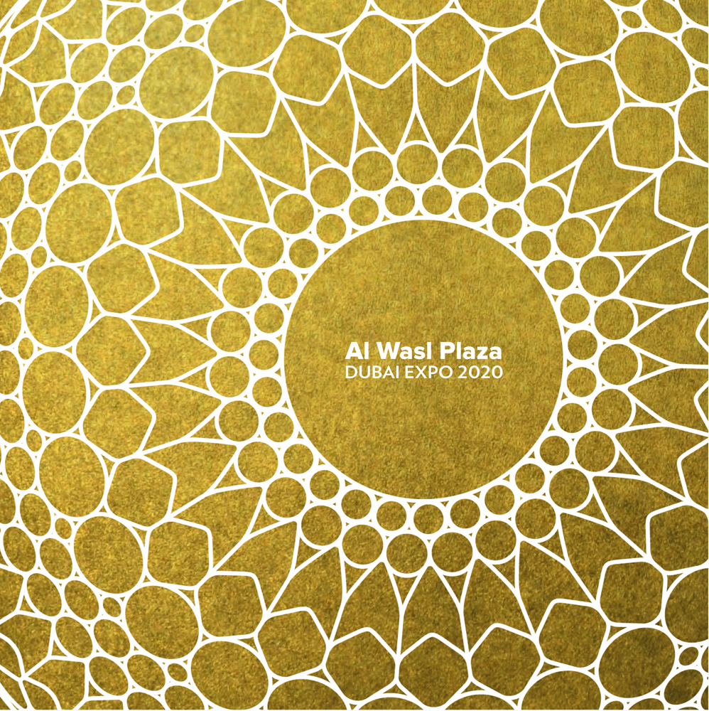 Gold cover with white geometrical spiral latticed pattern, Al Wasl Plaza Dubai Expo 2020 in white font to centre.