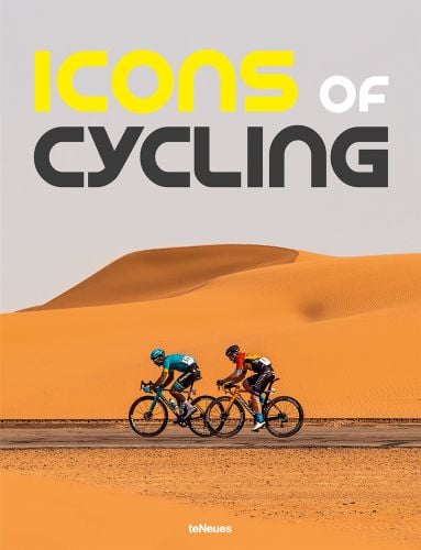 Two road racing bikers cycling on road with sand hills in the background and Icons of Cycling in yellow white and grey font above