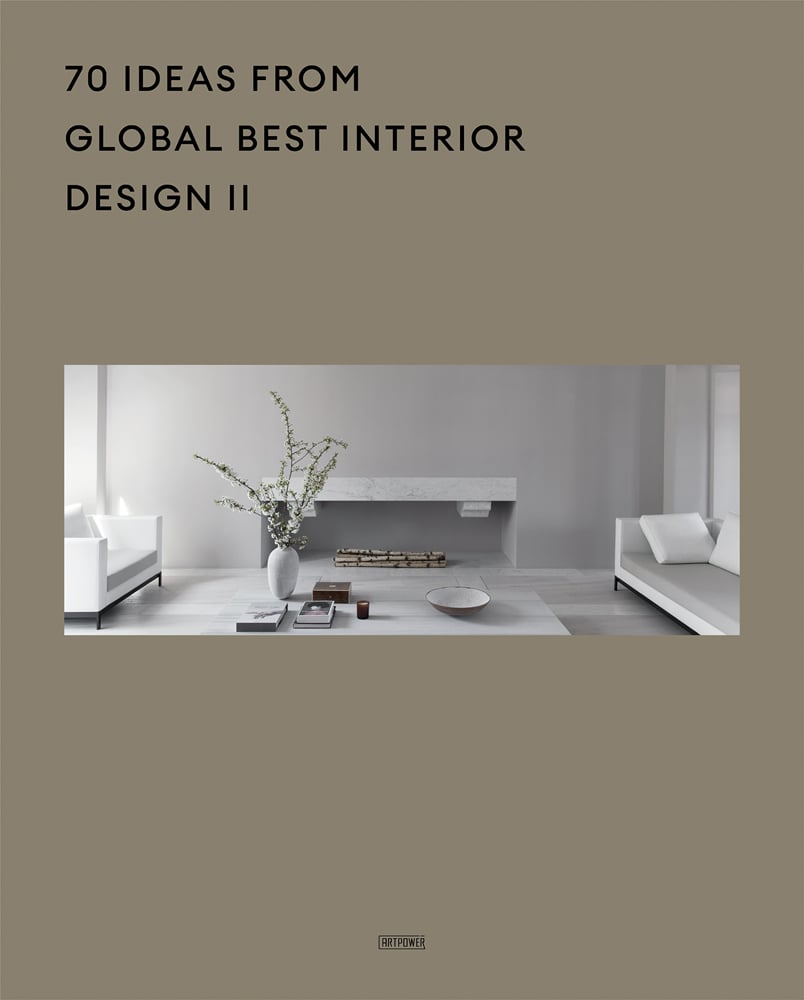 Book cover of 70 Ideas From Global Best Interior Design II, with a white interior living space with sofas, a table with vases and unit. Published by Artpower International.