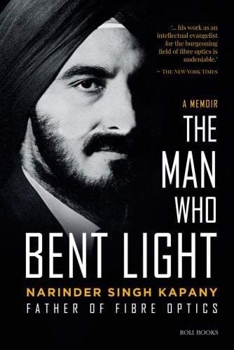 Black cover with head shot of Dr. Narinder Singh Kapany in black turban, The Man Who Bent Light in white font to lower right