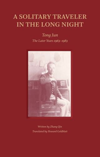 Chinese man sitting in chair with head and body turning to face us, on red cover of 'A Solitary Traveler in the Long Night, Tong Jun — The Later Years 1963–1983', by Images Publishing.