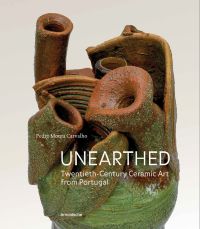 Ceramic heart with green glaze to bottom, on cover of 'Unearthed, Twentieth-Century Ceramic Art from Portugal', by Arnoldsche Art Publishers.