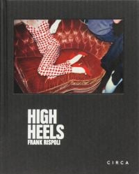 Small landscape photo mounted on black cover of figure lounging on red chaise longue with red stiletto heels and High Heels Frank Rispoli in white font below