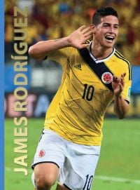 3/4 action shot of footballer James Rodriguez celebrating a goal with hand to ear in the Colombian yellow and white strip with James Rodriguez in gold vertically down left side