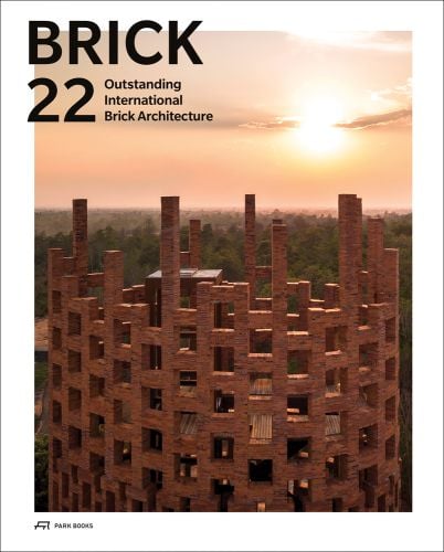 Book cover of Brick 22: Outstanding International Brick Architecture, with a tall roofless brick structure, with cityscape behind. Published by Park Books.