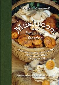 Basket of gold and white mushrooms on table, Mushroom Foraging and Feasting in white font, green border to left.