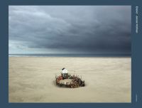 Sandy landscape with dark moody clouds above, small shack on silts, on landscape cover of 'Eiland', by Hannibal Books.