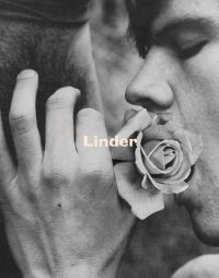 Erotic photograph of male with lips touching a rose, 'Linder', in cream font to centre, by Ridinghouse.