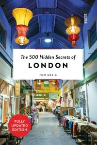 Brixton Village market in London, with hanging Chinese lanterns, on cover of 'The 500 Hidden Secrets of London', by Luster Publishing.