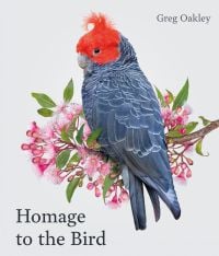 Australian gang-gang cockatoo with blue feathers and bright orange crest, sitting on branch of pink flowers, white cover, Homage to the Bird in black font to bottom left.