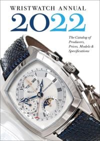 Benzinger Choptank silver watch with blue snakeskin strap, on white cover, Wristwatch Annual 2022 in black and blue font above.