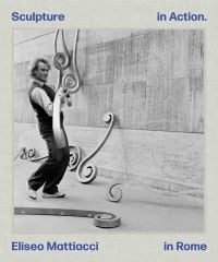 Book cover of Sculpture in Action Eliseo Mattiacci in Rome, with the Italian sculptor Eliseo Mattiacci assembling large installation sculpture on wall. Published by Ridinghouse.