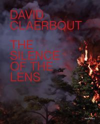 Forest landscape, tree on fire surrounded by thick black smoke, DAVID CLAERBOUT THE SILENCE OF THE LENS in red font to left side.