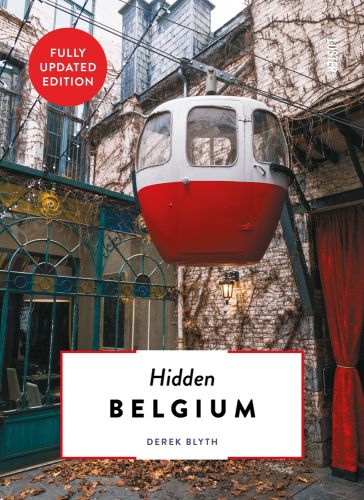 Apple shaped red and white cable car on wire, near arched windows, Hidden Belgium in black font on white banner below.