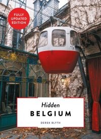 Book cover of Hidden Belgium, with a red and white cable car on wire. Published by Luster Publishing.