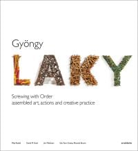 'LAKY' made from various materials, on white cover of 'Gyöngy Laky, Screwing with Order', by Arnoldsche Art Publishers.