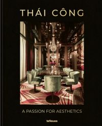 Luxurious interior with long dining table, art deco velvet chairs, chandelier above, THÁI CÔNG A PASSION FOR AESTHETICS, in gold font to top and bottom edge of black cover.