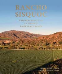 Vast landscape with vineyard, mountains behind, RANCHO SISQUOC ENDURING LEGACY OF AN HISTORIC LAND GRANT RANCH in gold font above.