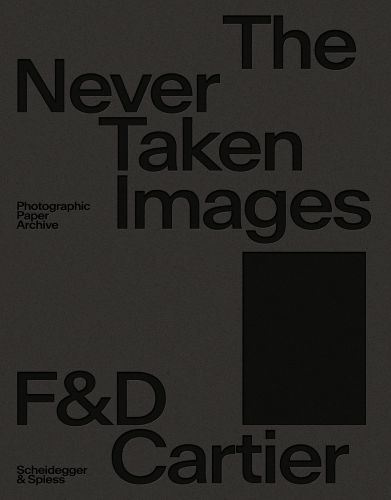 The Never Taken Images F& D Cartier in black font on grey cover, by Scheidegger & Spiess.