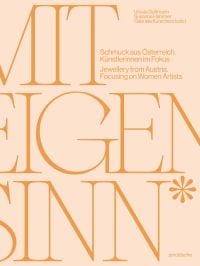 Beige cover with gold font on 'A Mind of Their Own, Jewellery from Austria. Focusing on Women Artists', by Arnoldsche Art Publishers.