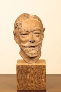 Book cover of Back into the Light: Four Women Artists – Their Works, Their Paths, featuring a sculpture of male head with large moustache, mounted on wood plinth. Published by Kerber.