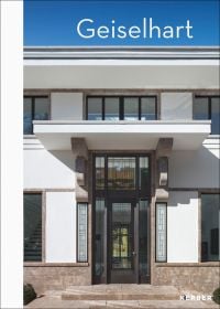 Façade of luxury villa with large glass panel door, 'Geiselhart', in white font above.