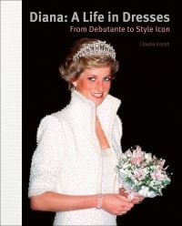 Book cover of Diana: A Life in Dresses: From Debutante to Style Icon, featuring Princess Diana in Catherine Walker's white silk crepe dress and jacket, adorned with pearls, and tiara on head. Published by ACC Art Books.