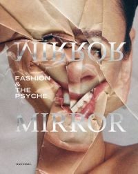 Portrait of white female on magazine page screwed up, MIRROR MIRROR, in silver font to centre of cover.