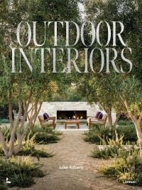 Outside seating area of Tehama 1 House in California, with fireplace, on cover of 'Outdoor Interiors', by Lannoo Publishers.